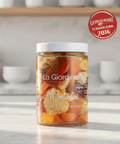 Jar of 'La Giardiniera' with 'Gambero Rosso' classification label on a kitchen counter.