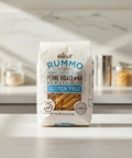 Bag of Rummo gluten-free penne rigate pasta on a kitchen counter