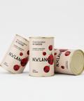 Three cans of Nulano cherry tomatoes on a white background