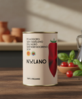 Nulano tomato can on a wooden table with kitchen items in the background