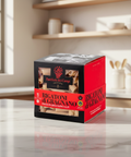 Box of Rigatoni pasta on a kitchen counter with shelves in the background
