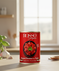 Rosso Gargano can of chopped tomatoes on a kitchen counter with a window in the background
