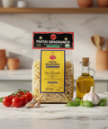 Pasta package with ingredients on a kitchen counter