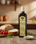 Bottle of Frantoio Cutrera olive oil on a wooden table with bread and tomatoes in a kitchen setting