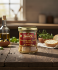 Jar of Callipo yellowfin tuna fillets on a wooden table with bread and olives in the background